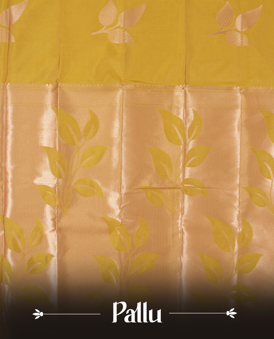 Mustard Yellow Semi Silk Saree with Matching Zari Woven Pallu and Border Featuring Subtle Floral Patterns, Tassel Detailing, and Coordinated Blouse Piece