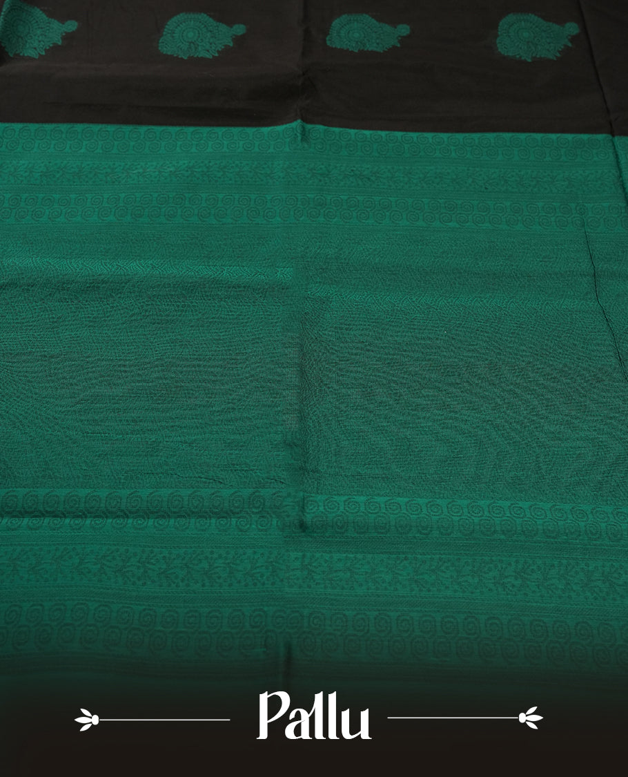Black colour soft silk cotton saree adorned with peacock colour motifs and Enhanced by a beautifully rich peacock colour woven contrasted pallu & Comes with a matching blouse piece for a complete look.
