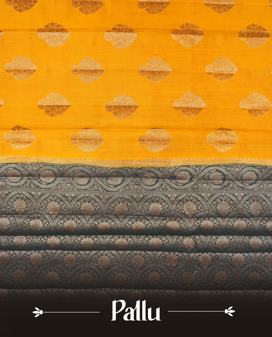 Mustard Colour Pure Banaras soft Silk Saree having gold floral motifs on Body with contrast Teal colour gold Floral kodi pattern on Border and matching Blouse