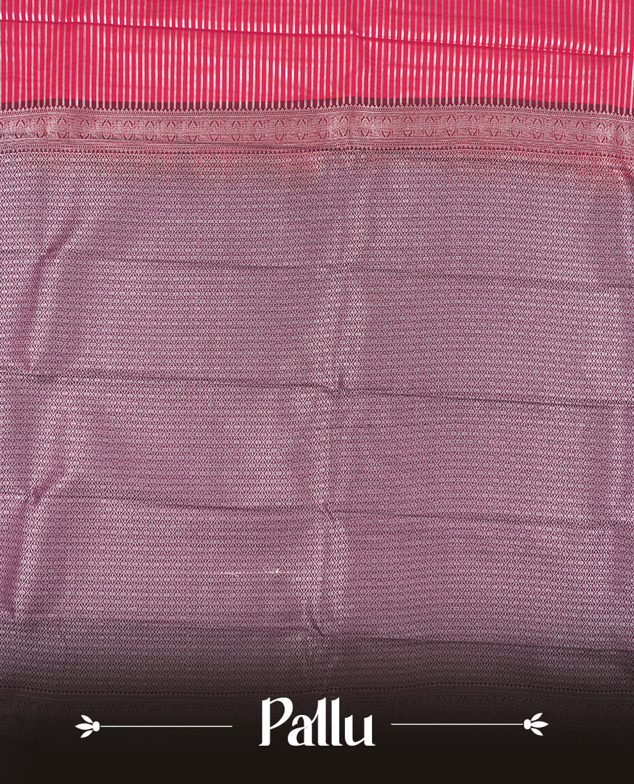 Rani pink colour Semi Silk Saree with silver zari patterns on the body, paired with a contrasting dark purple colour traditional pallu and border, and a matching blouse piece.