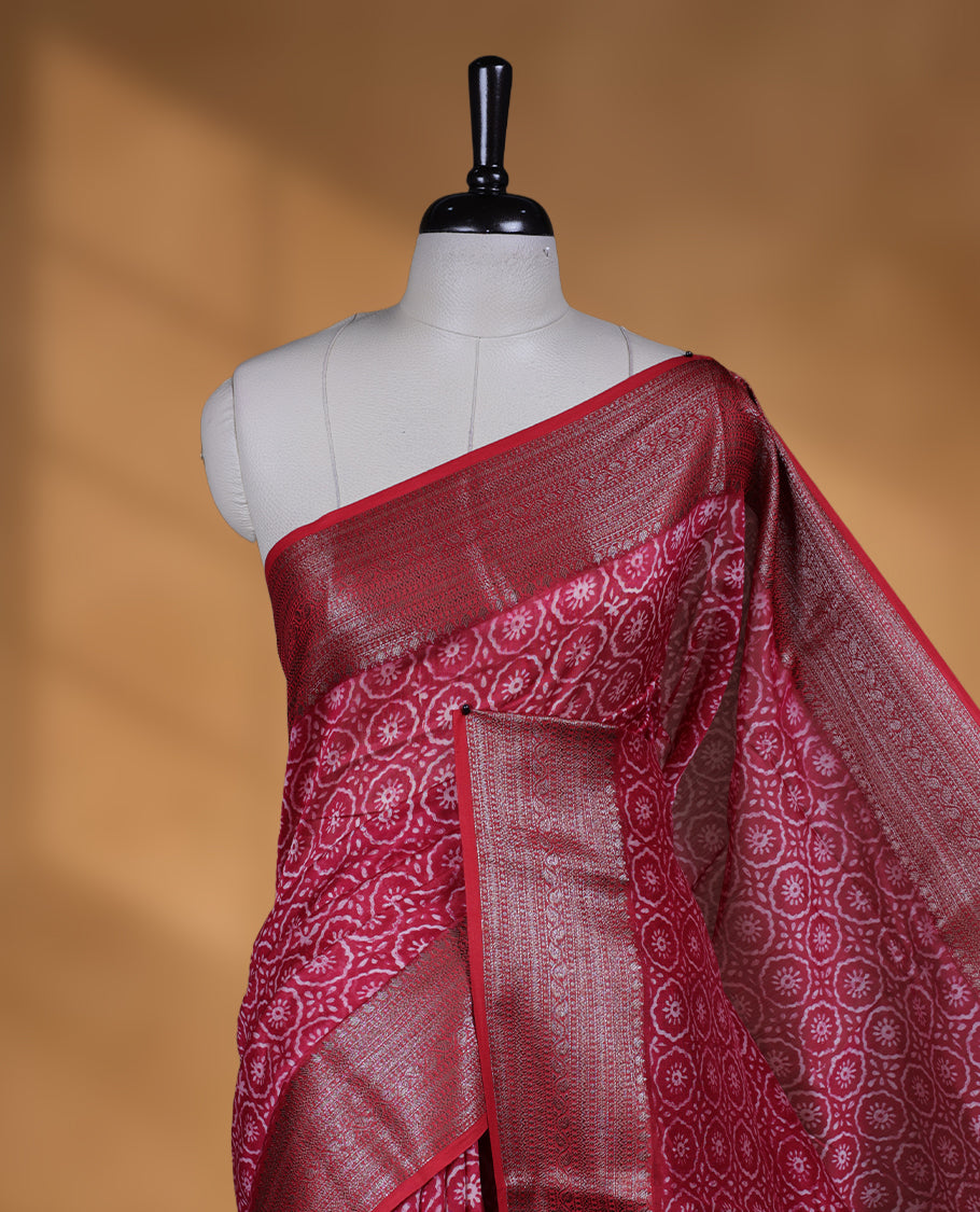 Red colour chanderi silk saree with Floral block print On body, compilmented by self colour border with antique zari pattern and a matching blouse.
