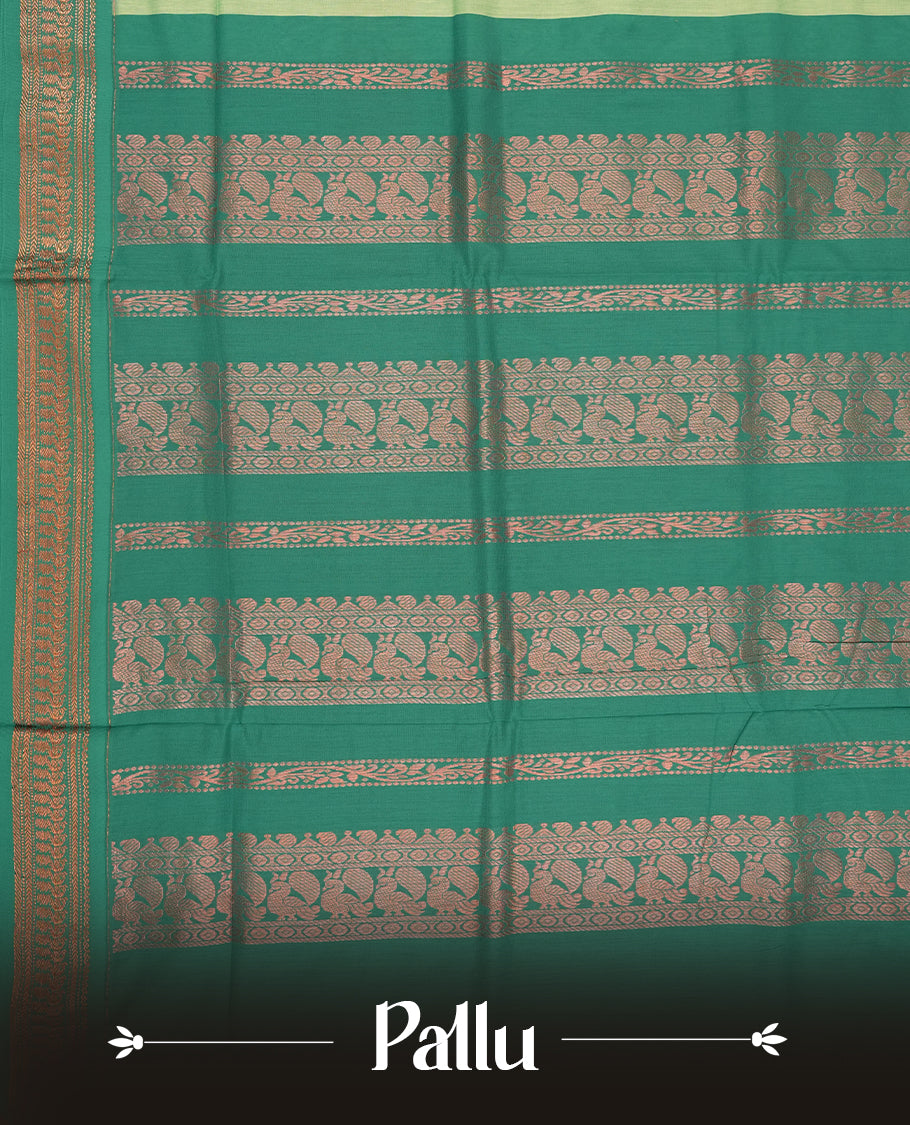 Mint green colour Kalyani cotton saree with subtle zari motifs all over, paired with a contrasting teal green rich copper zari woven border and pallu & Comes with a matching blouse piece.