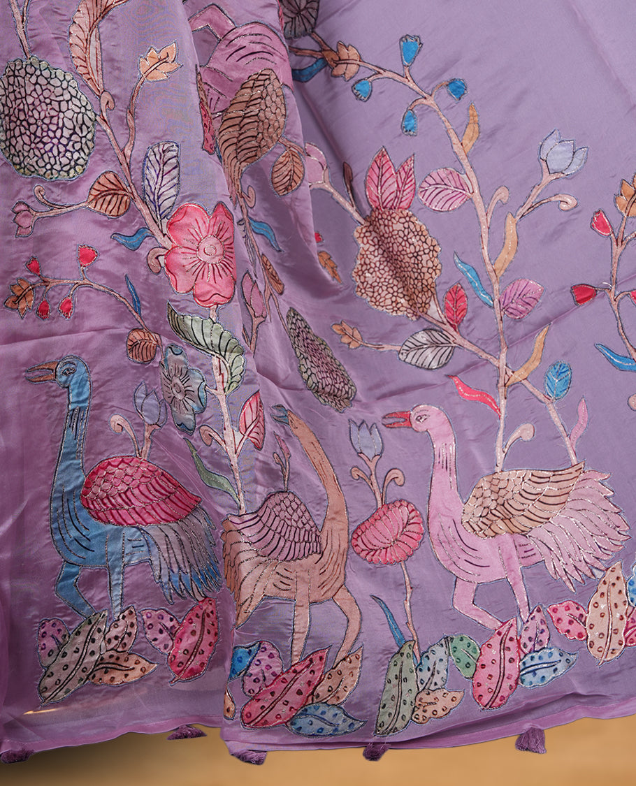 Lavender colour organza saree with multicolour thread embroidery on the pallu and fine border detailing, paired with a matching blouse. (Copy)