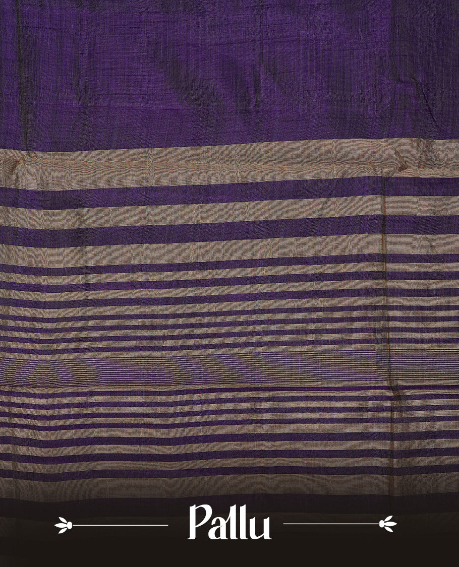 Purple colour semi tussar silk saree featuring an elegant plain body with traditional gold zari detailed border for a refined look. Comes paired with a matching blouse piece.