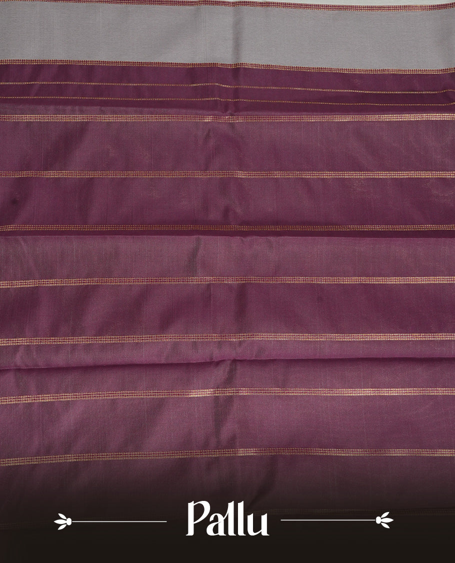 Off White Colour Semi Silk Saree Featuring Purple thread buttas On Body, Highlighted by contrast border with Mango motifs, paired with matching blouse piece.