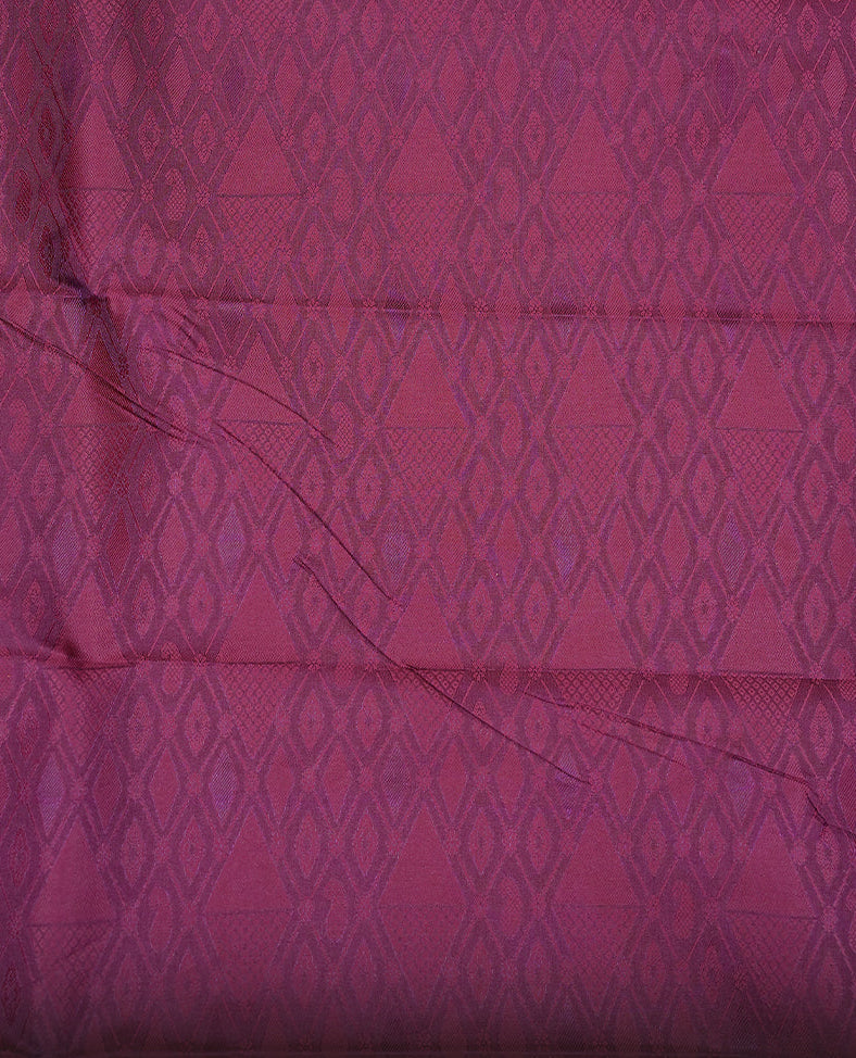 Maroon & gold colour Semi silk saree Featuring self colour zari motifs on body, complemented by contrast burgundy colour with gold zari border, paired with matching blouse piece.