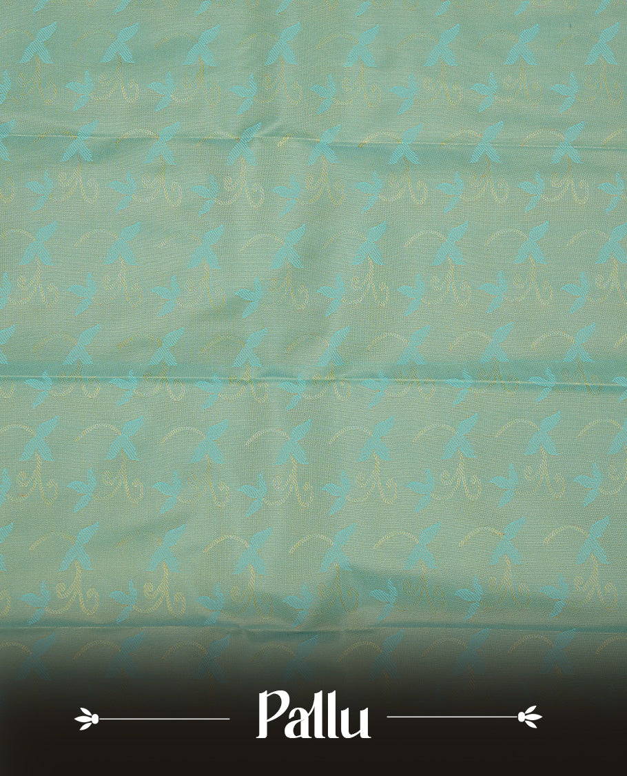 Sandalwood colour Semi silk saree featuirng Cream colour patterns on body, complemented by contrast Green colour with gold zari border, paired with matching blouse piece.