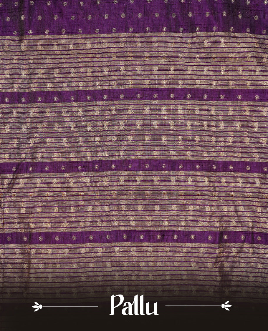 Purple colour semi tussar silk saree featuring gold zari dot motifs all over the body, highlighted by a self colour border with intricate gold zari temple patterns. Comes paired with a matching blouse piece.