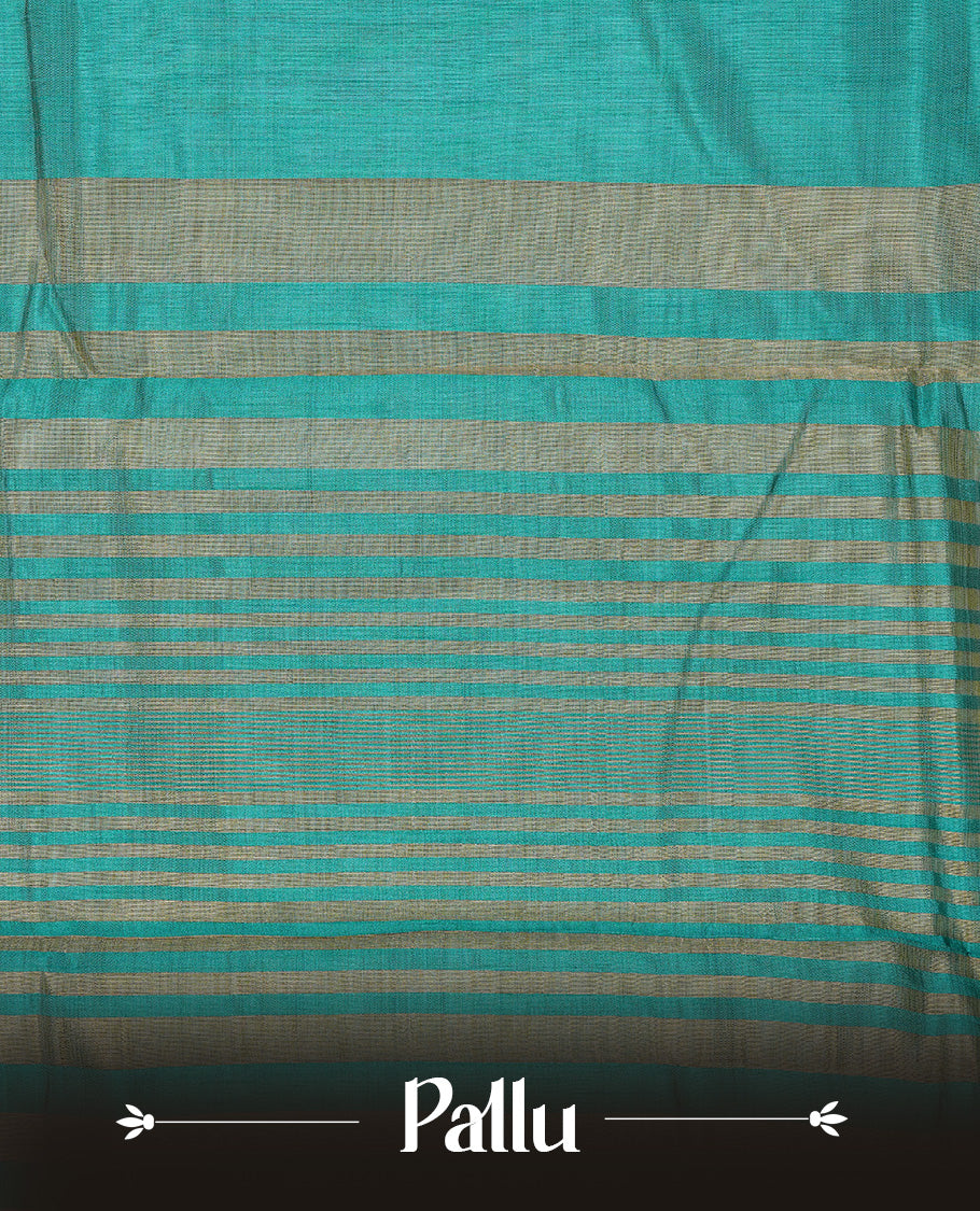 Aqua colour semi tussar silk saree featuring an elegant plain body with traditional gold zari detailed border for a refined look. Comes paired with a matching blouse piece.