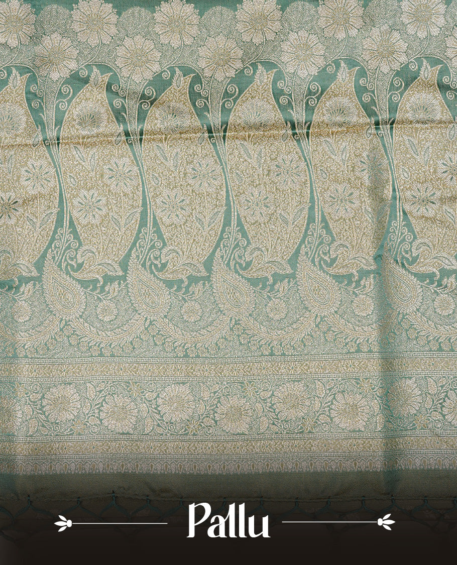 Teal colour Mulberry silk saree featuring gold zari motifs on body, complemented by contrast self colour with gold zari border, comes with matching blouse piece.