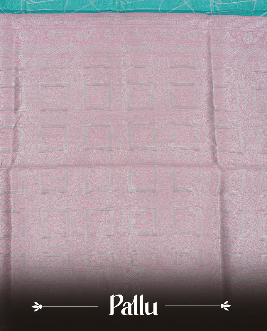 Aqua colour semi silk saree featuring Silver zari Geometric pattern on body, complemented by contrast peach colour with silver zari border, comes with matching blouse piece.