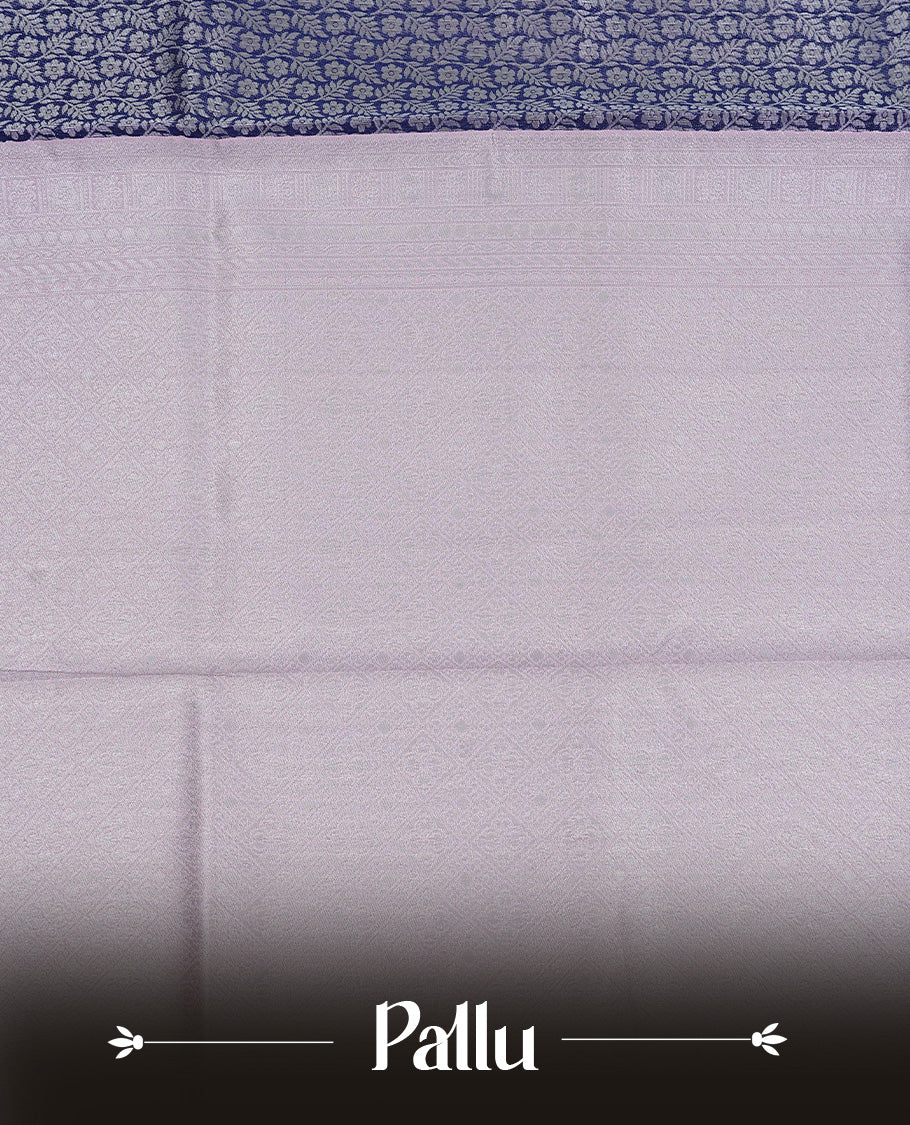 Navy blue colour semi silk saree featuring Silver zari pattern on body, complemented by contrast Pink colour with silver zari border, comes with matching blouse piece.