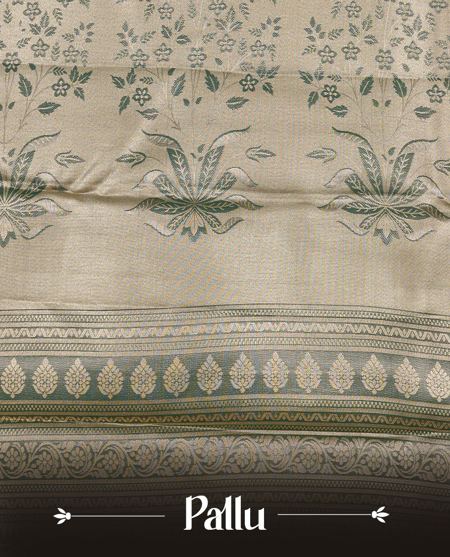 Light green colour Tissue silk saree featuring Gold & silver colour floral zari motifs on body, complemented by contrast Light green with gold zari border, paired with matching blouse piece.