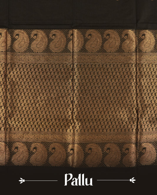 Black colour Chettinad cotton saree adorned with small woven motifs on the body, highlighted by a maroon border featuring intricate golden zari floral patterns and temple design & Comes with a matching blouse piece.