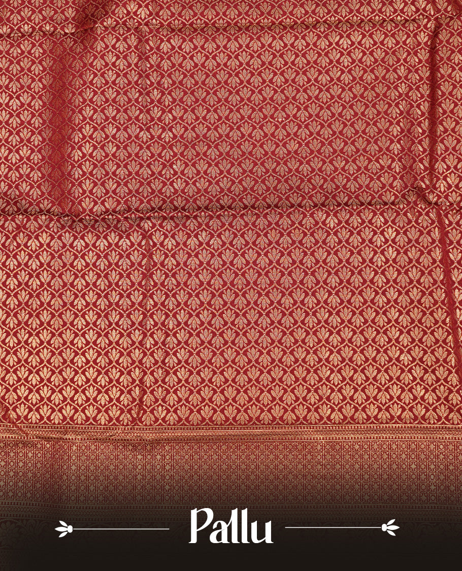 Maroon Semi Wedding Silk Saree featuring Gold Zari Motifs On body, Complemented with traditional zari with Self colour border, paired with matching blouse piece.