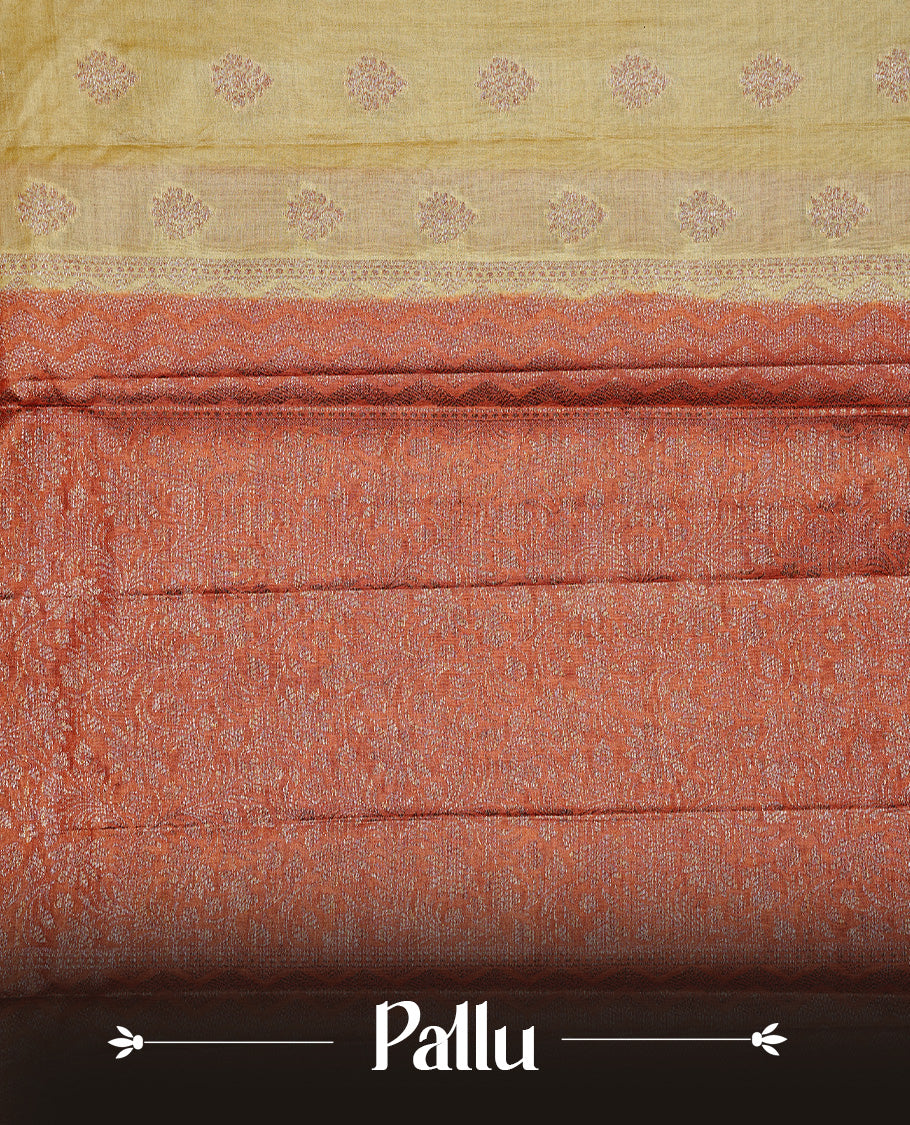 Pale Yellow Colour Tussar silk saree featuring Antique Zari motifs on body, Finished with contrast Orange colour Zigzag zari pattern border, paired with matching blouse piece.