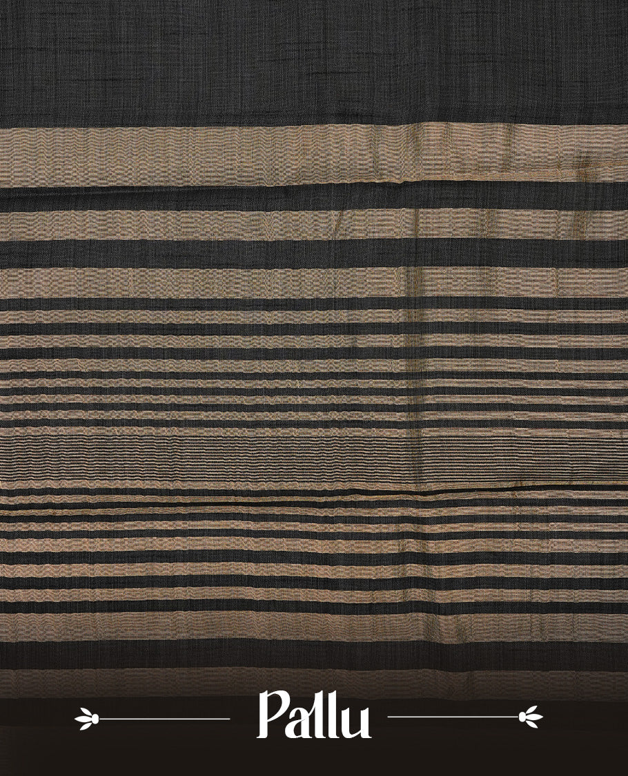 Blackish Grey colour semi tussar silk saree featuring an elegant plain body with traditional gold zari detailed border for a refined look. Comes paired with a matching blouse piece.