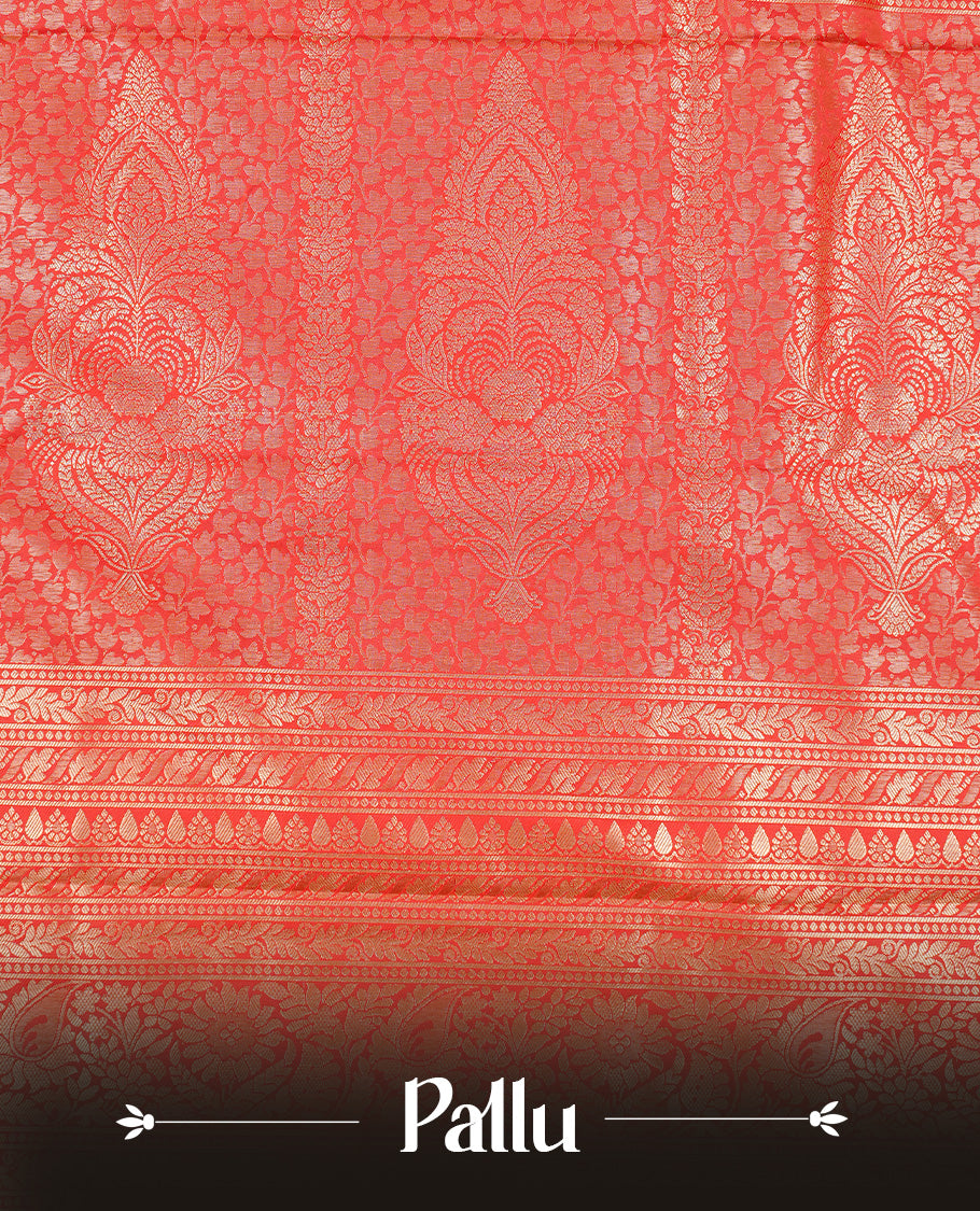 Red Colour semi wedding silk saree featuring Gold zari leaf motifs on body, complemented by Traditional zari on self colour border with green colour piping, paired with matching blouse piece.