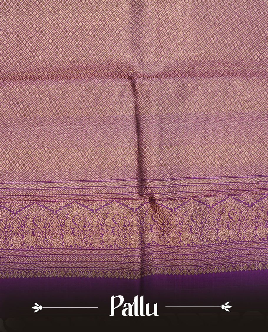 Deep purple colour Traditional kancheepuram silk saree featuring gold & silver zari motifs on body, complemented by self colour with traditional border, comes with matching blouse piece.