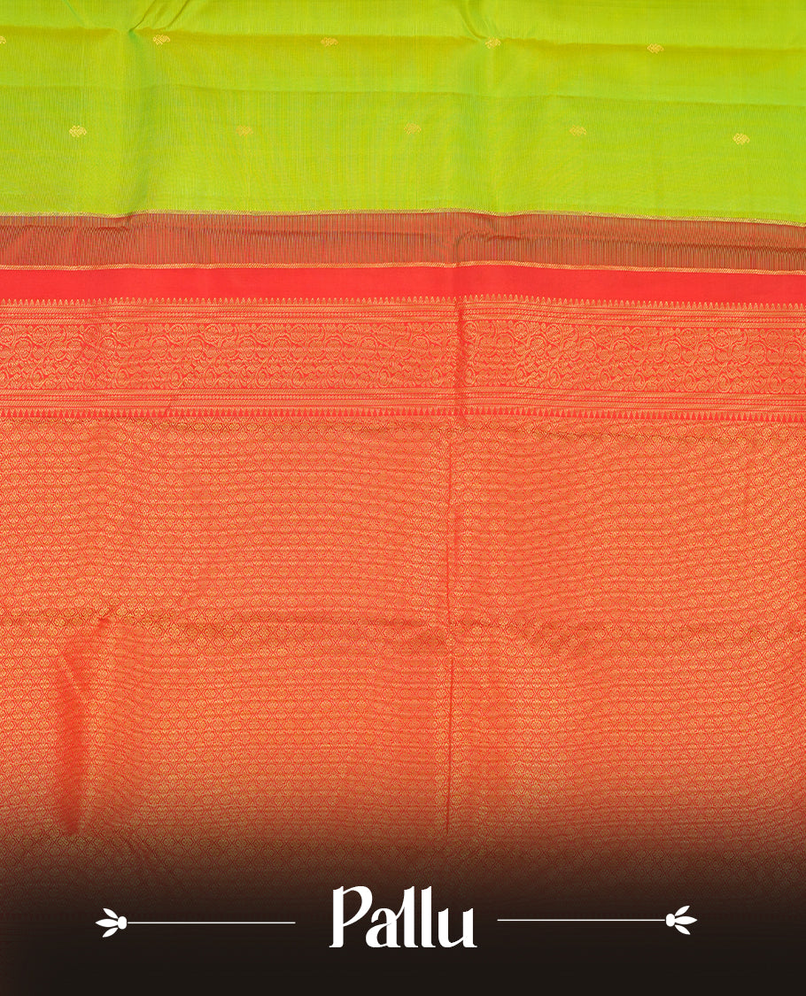 Lemon green colour Vasundhara silk saree adorned with all-over gold motifs on the body, complemented by a contrast red colour with gold simple traditional border and paired with a matching blouse piece.