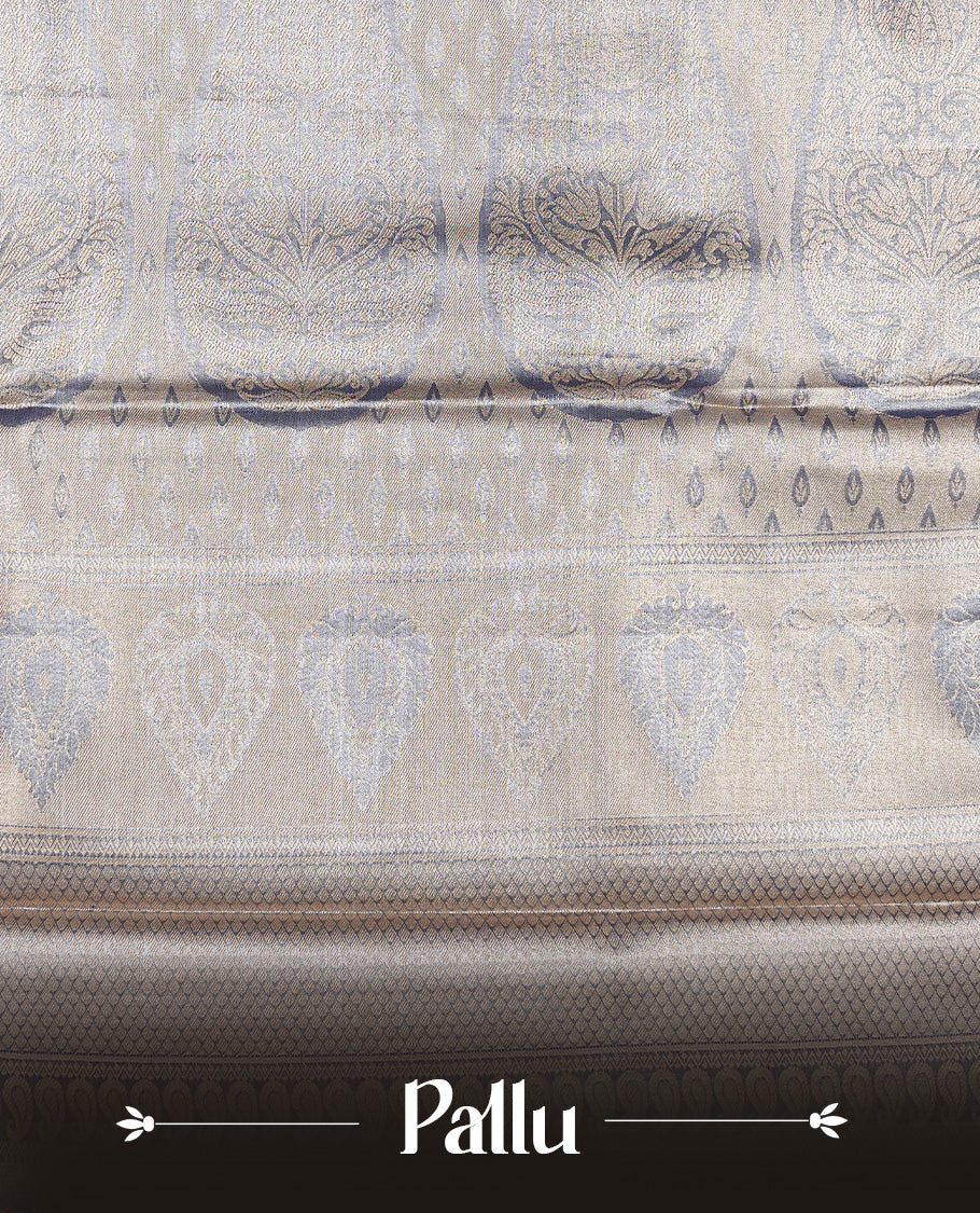 Pink colour tissue silk saree featuring Gold, Blue & silver zari kodi pattern on body, complemented by contrast violet colour with traditional border, paired with matching blouse piece.