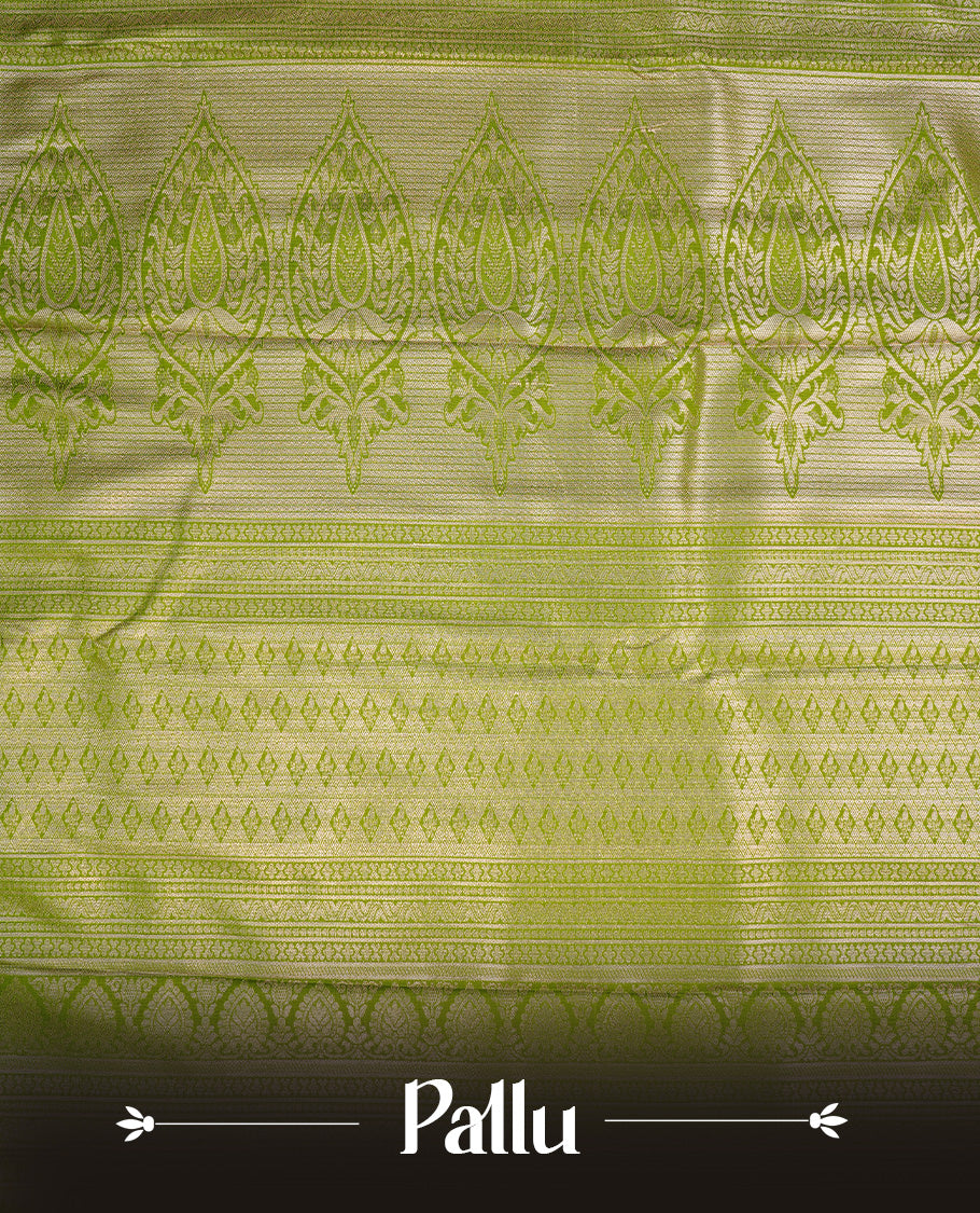 Silver colour semi wedding saree featuring silver zari floral kodi pattern on body, contrast Light green colour with traditional border, paired with matching blouse piece.