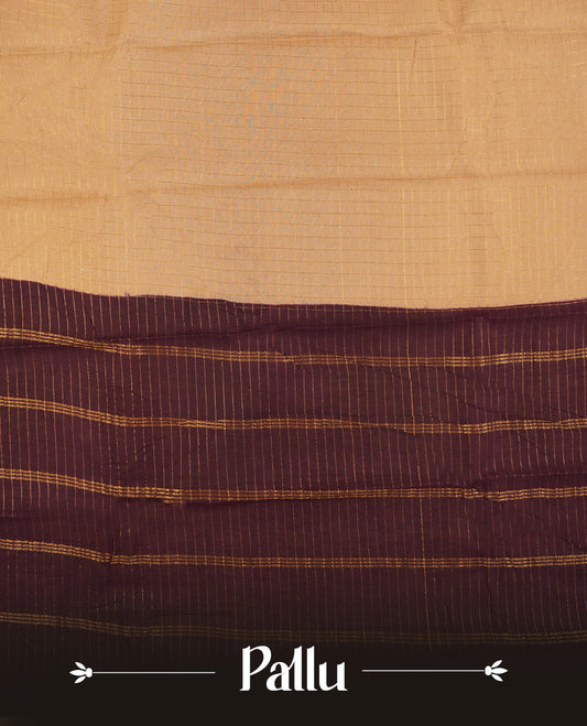 Beige colour Chettinad cotton saree adorned with subtle checked patterns on the body, complemented by an exquisite dark maroon border featuring golden peacock motifs & Paired with a matching blouse piece.