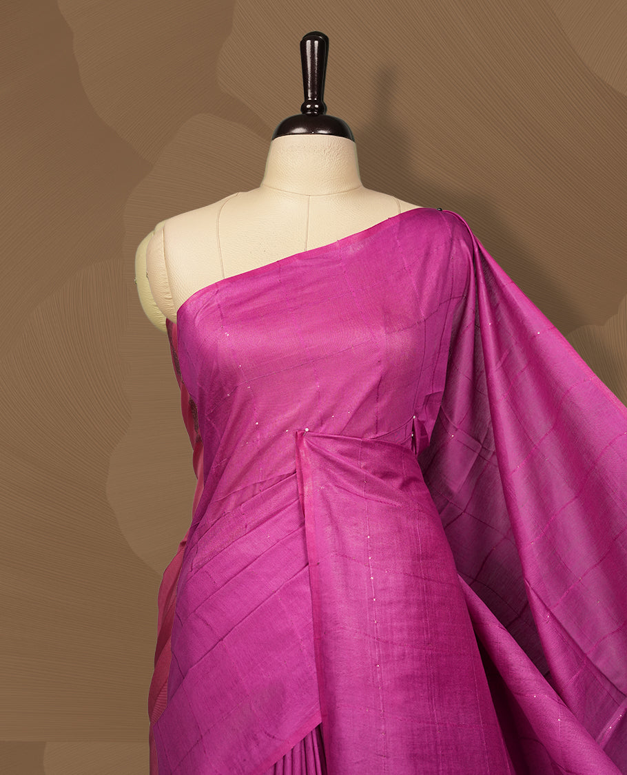 Dark Raspberry colour semi jute saree with vertical striped pattern sequins for a modern appeal , Soft texture, sleek border, tassel pallu, & Includes matching blouse piece for a complete look.