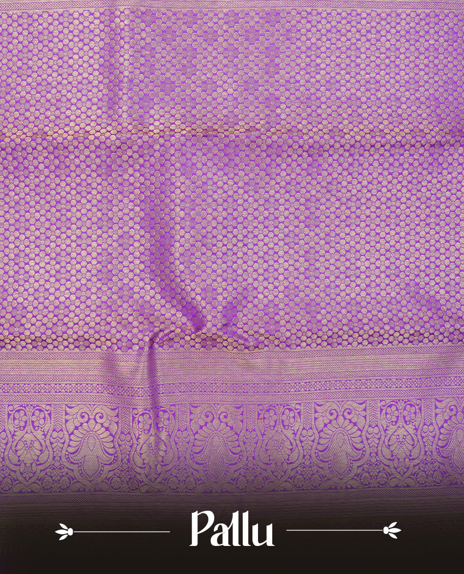 Violet colour pure wedding silk saree featuring silver & gold zari Designed pattern on body, complemented by self colour with traditional border, comes with matching blouse piece.