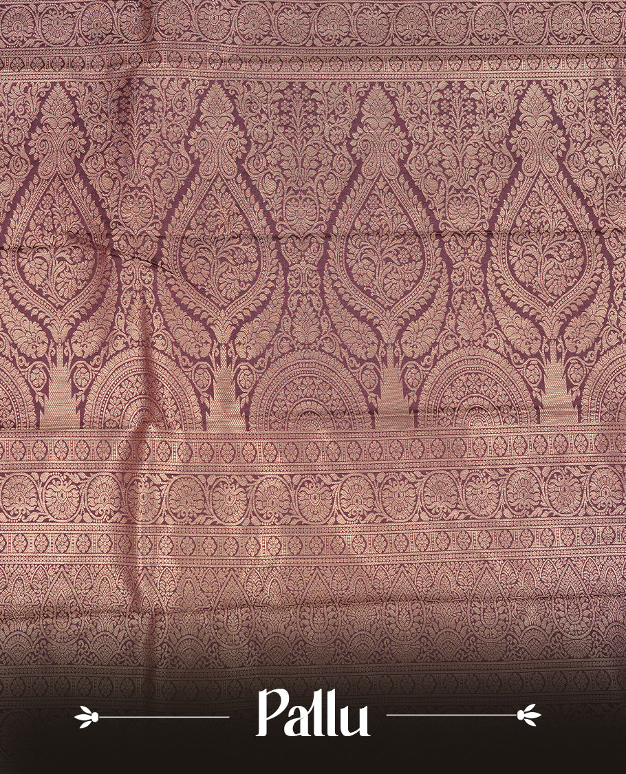 Dark chocolate colour Semi silk saree Featuring gold zari motifs on body, complemented by Self colour with gold zari border, paired with matching blouse piece.