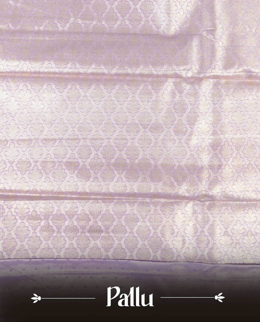 Lavender & Silver colour Double shade Semi tissue silk saree featuring self color Floral pattern on body, Contrast Lavender colour with Fancy border, paired with matching.