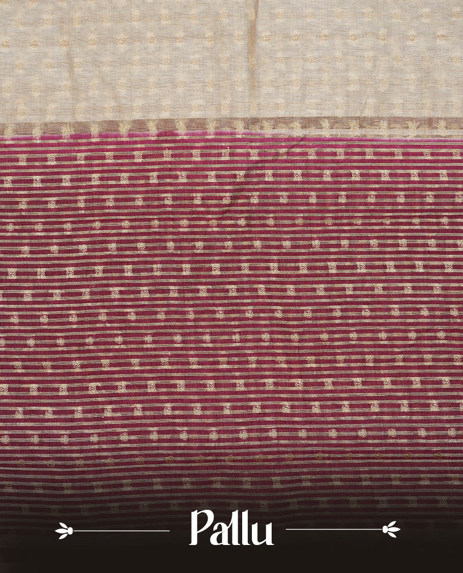 Cream colour Semi Tussar silk saree featuring an Gold zari motifs on body, accentuated by a contrast Maroon border adorned with intricate gold zari work, paired with a matching blouse piece.