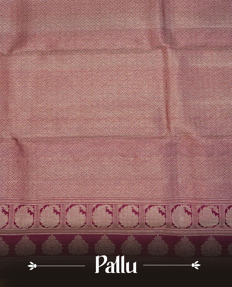 Wine Colour Pure Kancheepuram Silk Saree Featuring Gold Zari Motifs on the Body, Highlighting a Traditional Gold Zari Border, Paired with a Matching Blouse Piece.