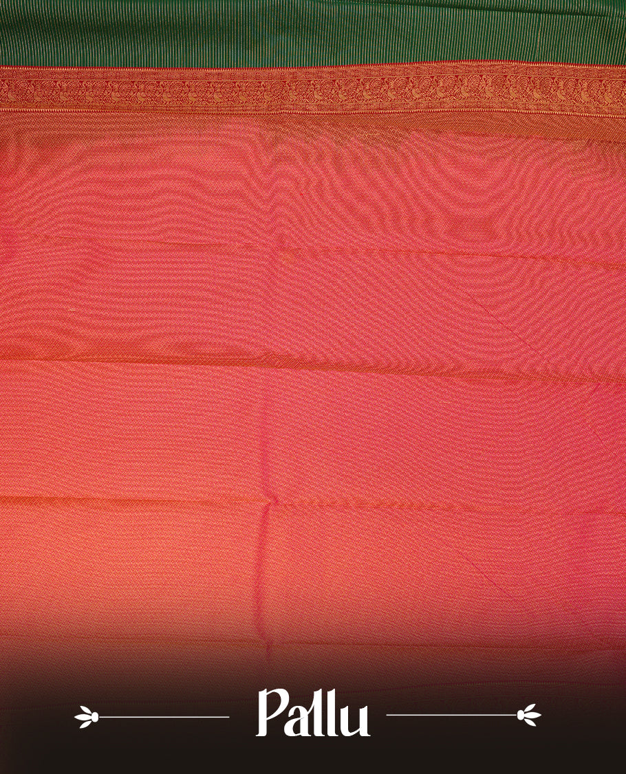 Dark Green coloured soft silk saree featuring gold zari stripes and motifs across the body, enhanced with a contrast Magenta border and pallu, paired with a matching contrast blouse piece
