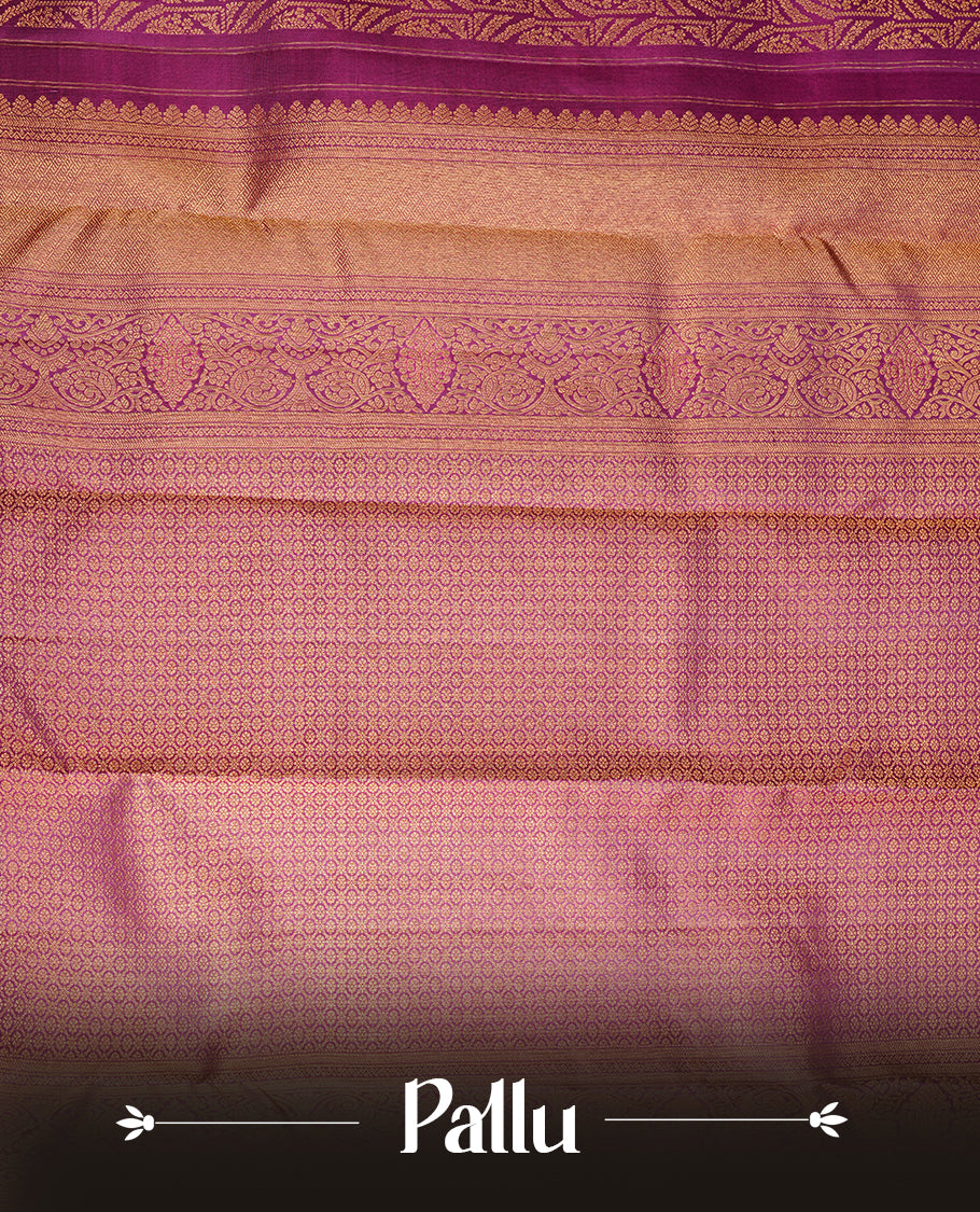 Purple colour kancheepuram silk saree featuring gold zari pattern across body, complemented by selfcolour border traditional zari border, paired with matching blouse piece.