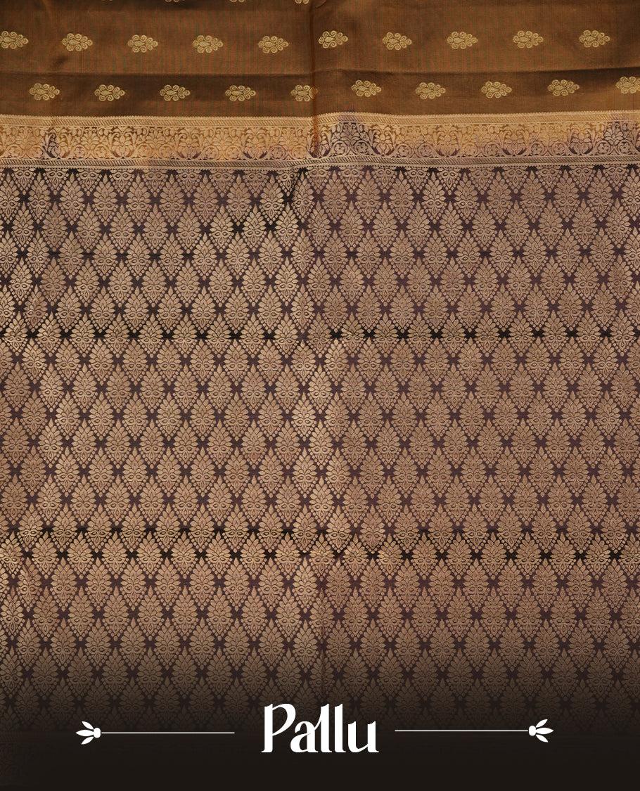 Khaki colour soft silk saree featuring gold zari motifs on the body, complemented by a contrast chocolate traditional zari border and pallu, paired with matching blouse piece.