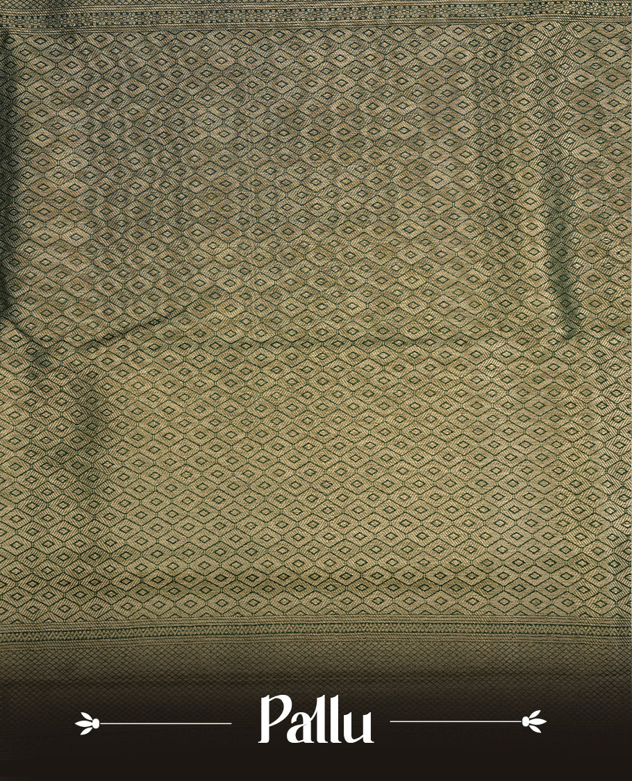 Emerald green colour soft silk saree featuring gold zari pattern on body, complemented by self colour with traditional border, paired with matching blouse piece.