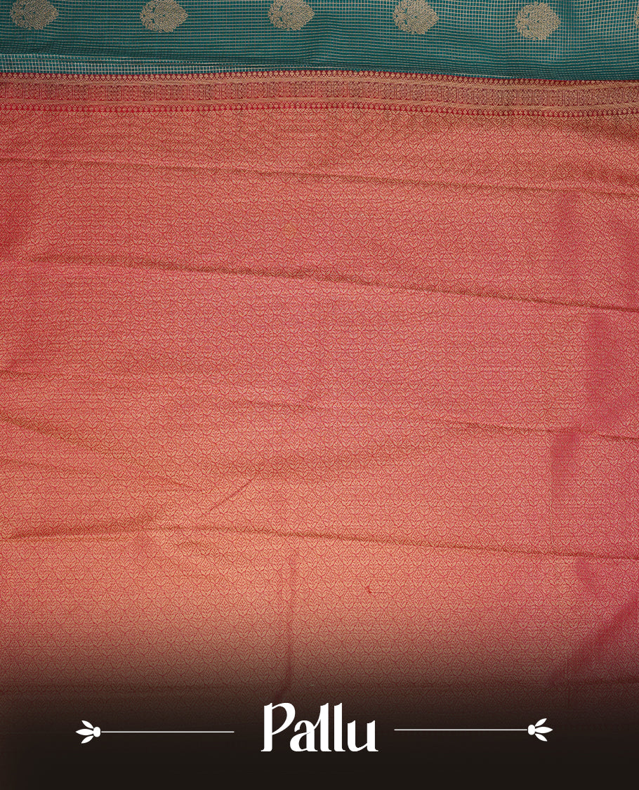 Green coloured soft silk saree featuring gold zari stripes and motifs across the body, enhanced with a Self colour border and pallu, paired with a matching contrast blouse piece.