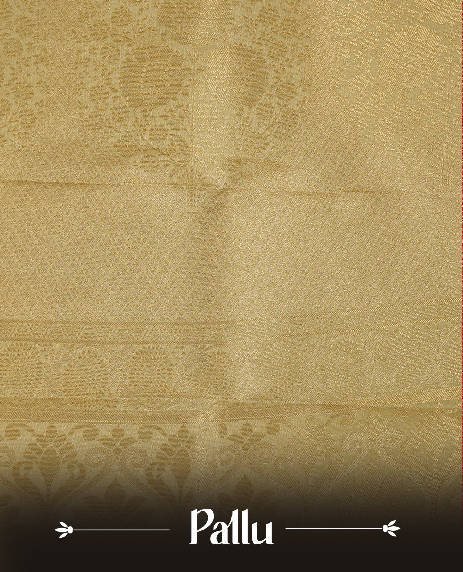 Orange coloured soft silk saree featuring gold zari stripes and motifs across the body, enhanced with a contrast Cream border and pallu, paired with a matching contrast blouse piece.