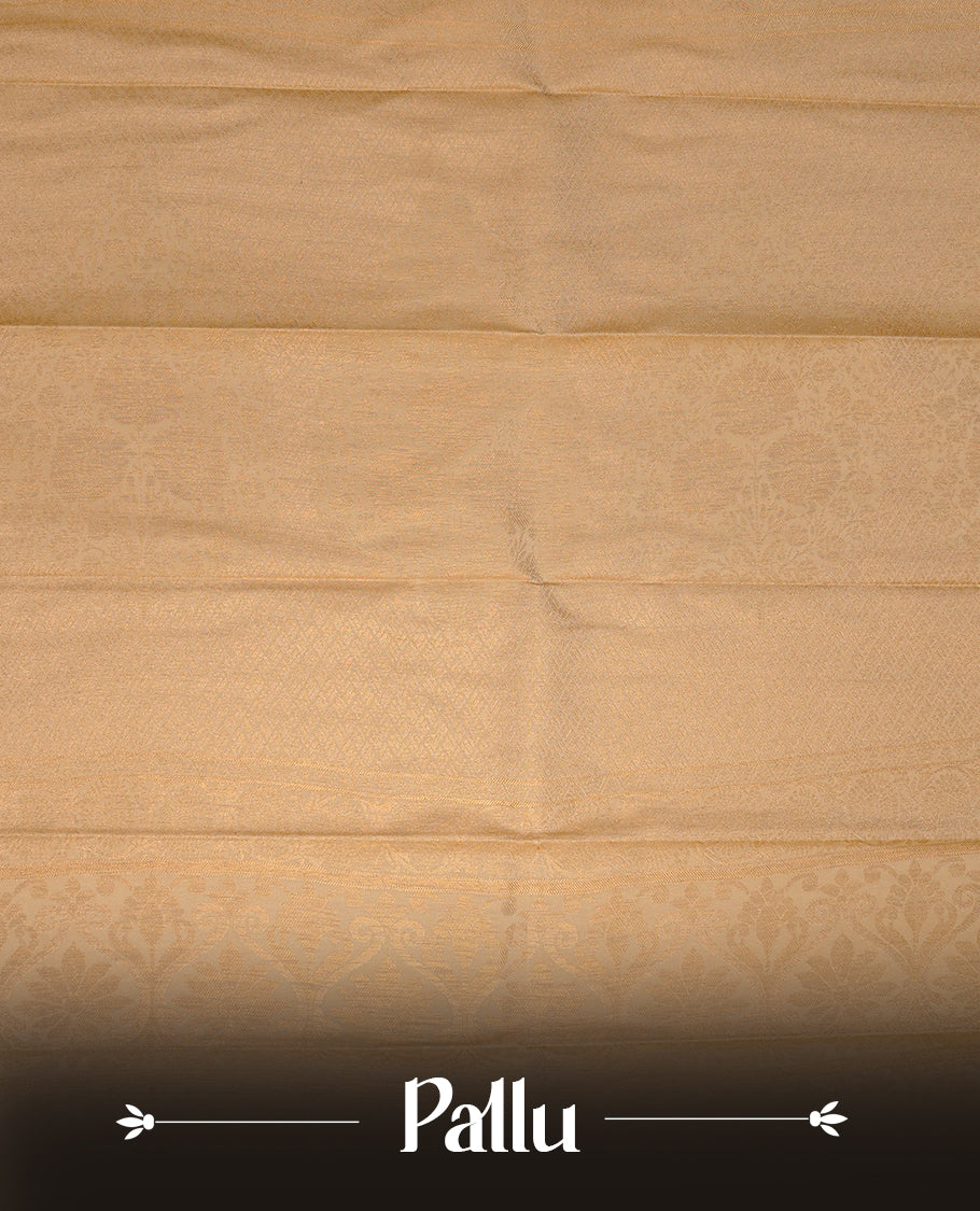 Orange coloured soft silk saree featuring gold zari stripes and motifs across the body, enhanced with a contrast Cream border and pallu, paired with a matching contrast blouse piece.