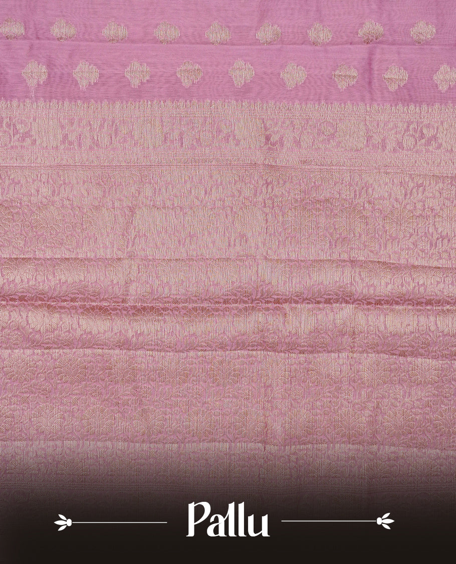 Onion Pink colour Tussar Silk saree featuring antique zari butta motifs on Body , enhanced with a self coloured floral Gold zari border and pallu, paired with a matching blouse piece.