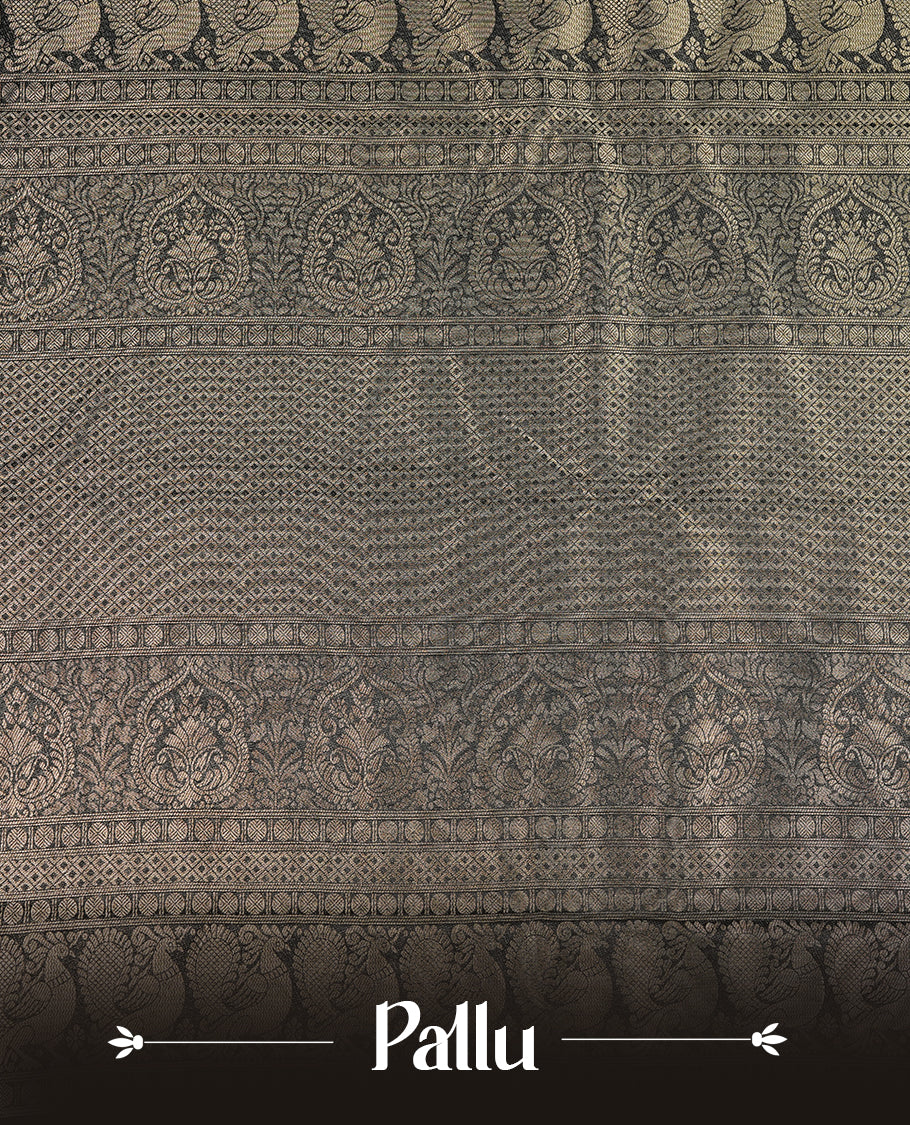 Black colour soft silk saree featuring gold zari pattern on body, complemented by self colour with traditional border, paired with matching blouse piece.