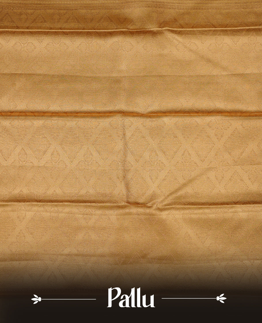 Gold colour semi tissue silk saree featuring gold zari pattern on body, self colour with gold zari traditional border, paired with matching blouse piece.