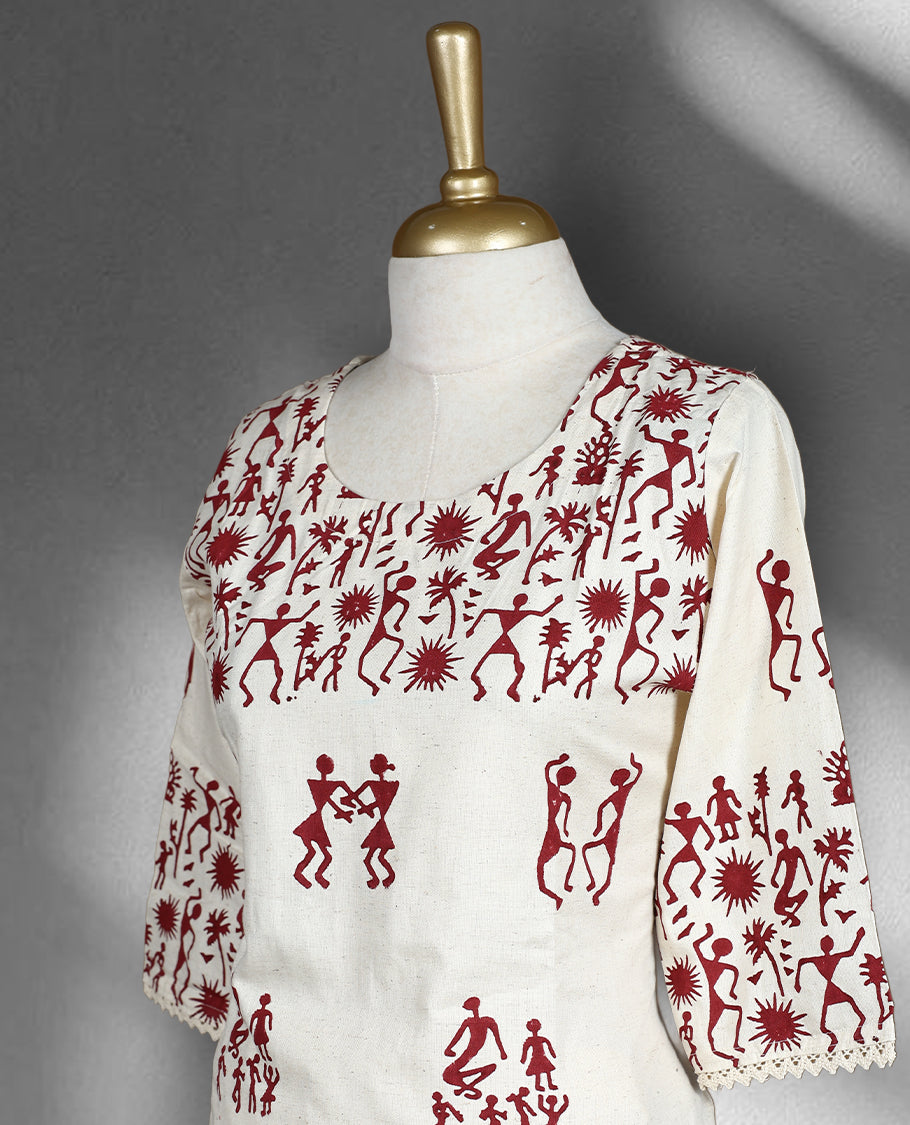 Off white colour cord set with deep maroon Warli inspired print, featuring a round neck top with elbow length sleeves and side slits, paired with matching straight fit pants.