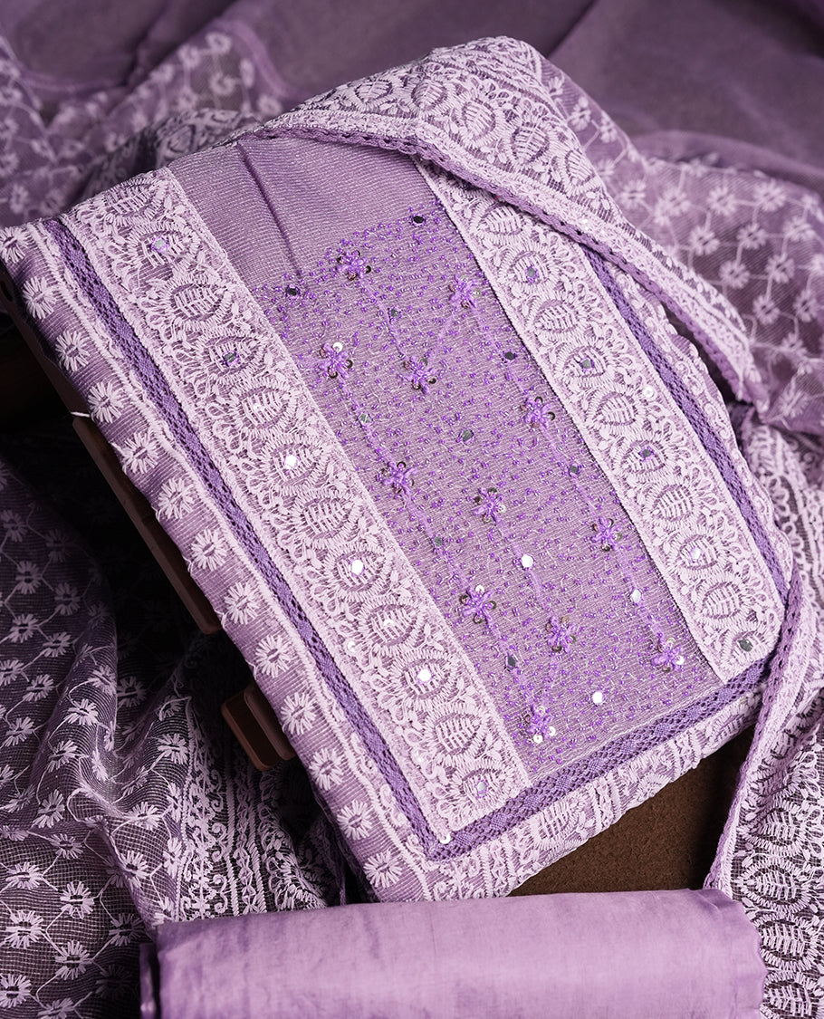 Lavender Churidar Material featuring Intricate Thread Embroidery with Mirror and Cut Beads Work on the Front Panel, paired with an All Over Embroidered Net Dupatta and Matching Bottom