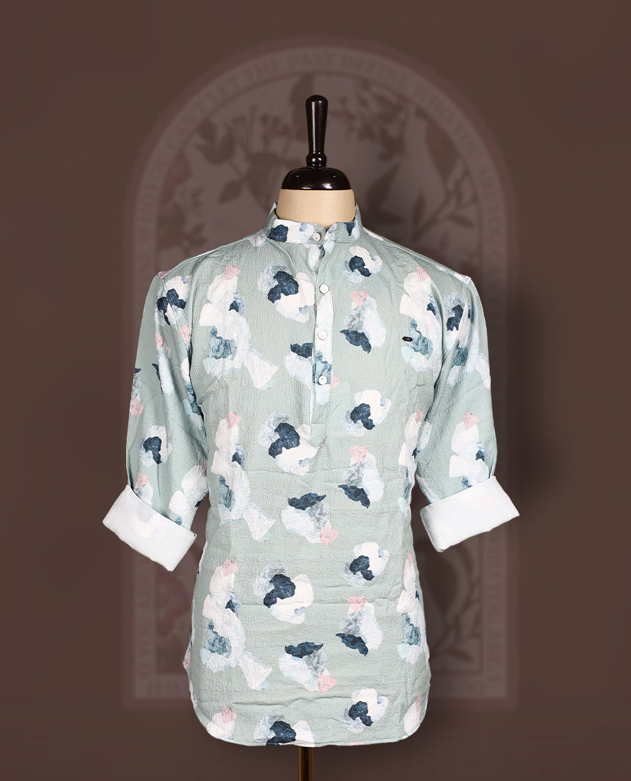 Pastel green colour short kurta in crush fabric with digital floral print, Features a mandarin collar and full sleeves, Lightweight, modern, and perfect for casual or semi-formal occasions.