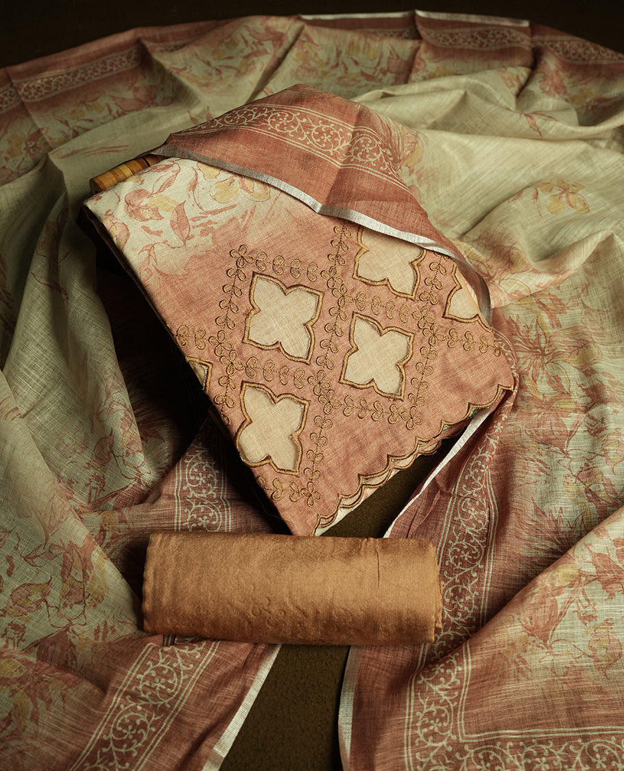 Soft Brown colour churidhar material featuring floral and cutwork embroidery on the front panel, digital floral printed dupatta with elegant border, and matching plain bottom.