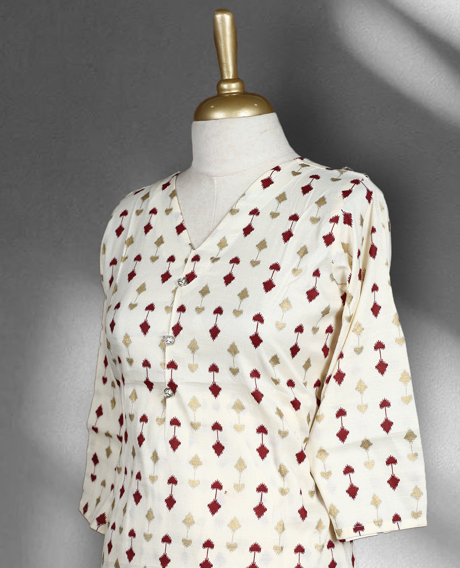 Off white colour cord set with subtle maroon and golden colour geometric prints, featuring a V neck top with a straight cut design and matching pants.
