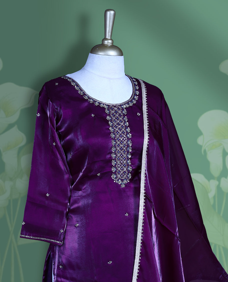 Violet colour churidar set featuring elegant white thread embroidery on the neckline, sleeves, and scattered motifs across the body, Paired with a matching embroidered dupatta