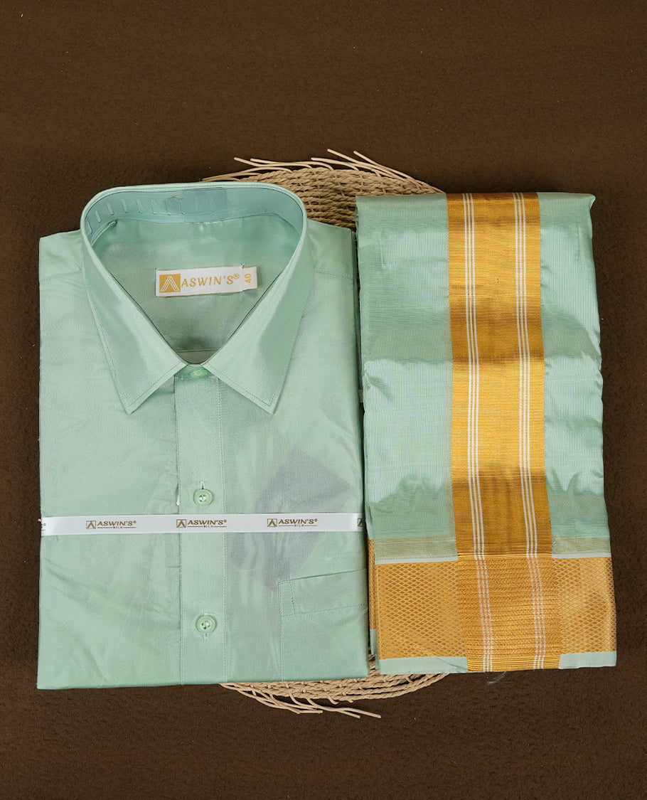 Pista colour Aswin’s wedding set featuring a refined silk shirt and matching dhoti with gold zari detailing, crafted for timeless elegance and perfect for traditional weddings and festive occasions.